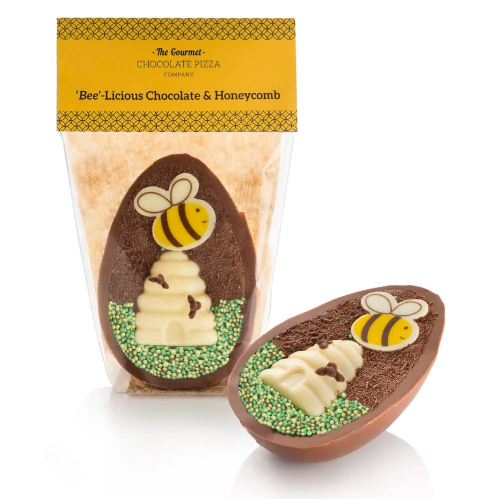Our new Bee-licious Chocolate & Honeycomb Egg, offers a milk chocolate egg shell half, filled with a honeycomb tiffin. Decorated with brownie biscuit crumb, green sprinkles and a white chocolate hive and bee!